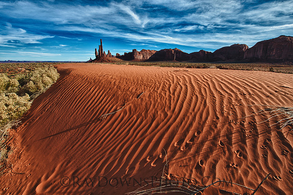 Monument Valley sand dunes and totem